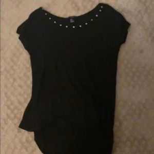 black shirt with beads on coller